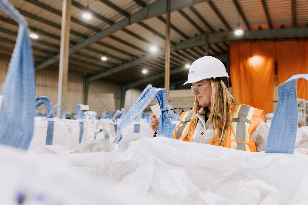 Electra employee inspecting product for customer shipment